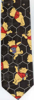 winnie the pooh poses with honeycomb pattern behind bee hunny honey necktie Tie ties neckwear ties tye neckwears